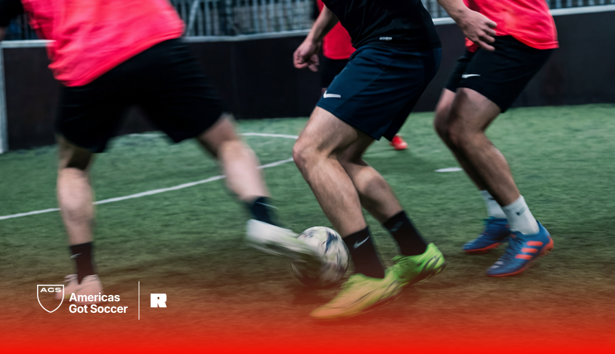 Men’s indoor soccer team playing 5v5 match at AGS Fort Lauderdale on turf field